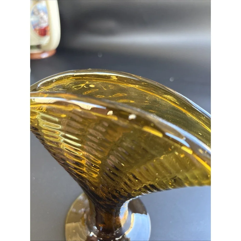 Mid-Century Modern Amber Glass Fan Vase featuring an optic ribbed pattern.